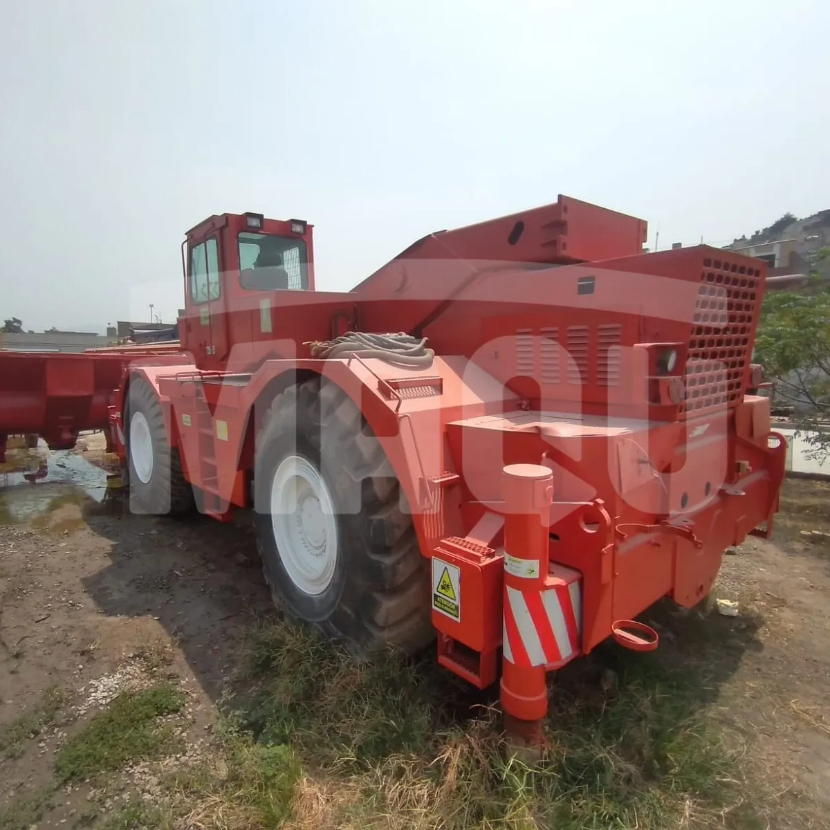 Lanzador de concreto GROVE RT9100 (1996)